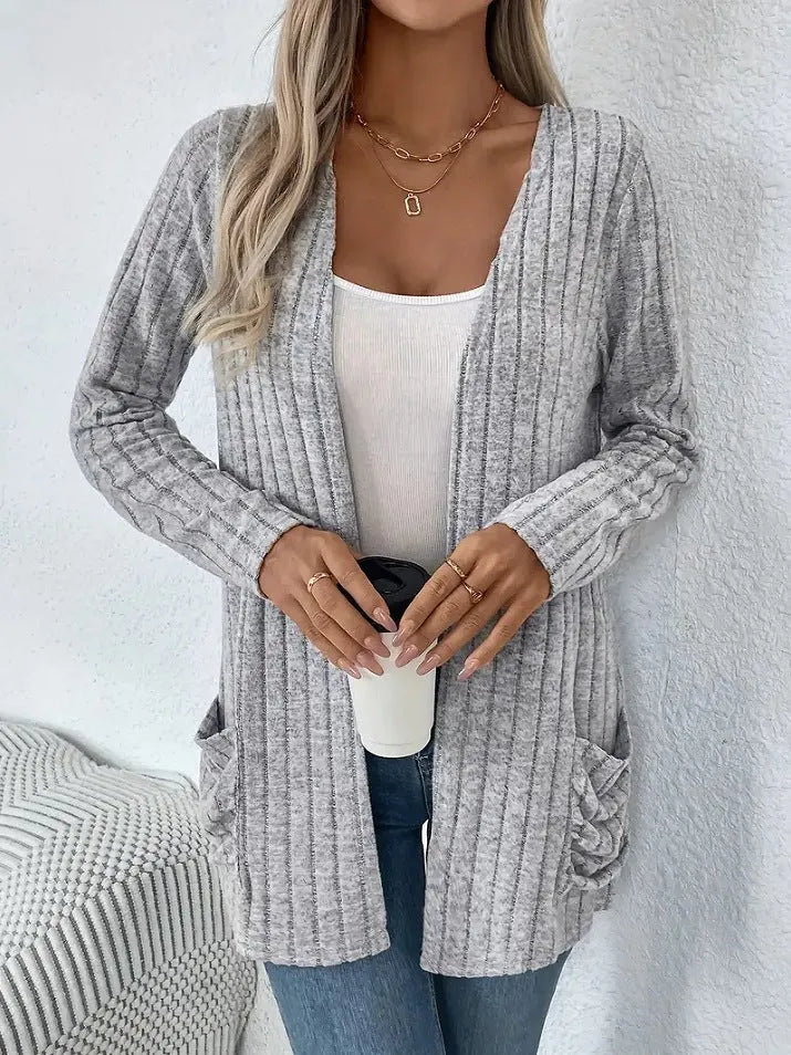 Women's solid colour long sleeve cardigan with pockets in loose fit, shown in Granny Grey.
