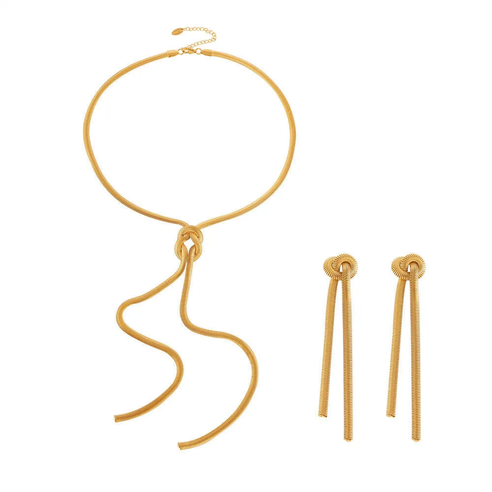 Gold knotted tassel pendant on snake chain necklace with matching earrings