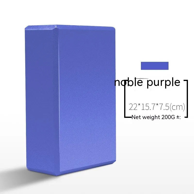 High-density EVA foam yoga block in various colours and prints on a workout mat.