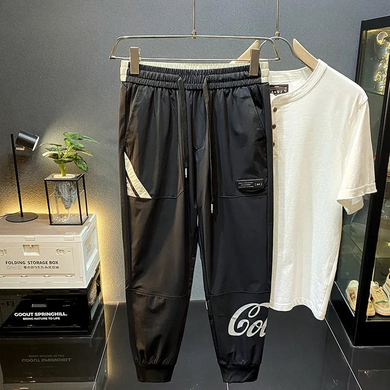 Black men's cropped trousers with elasticated ankle bands in ultra-thin ice silk cotton fabric