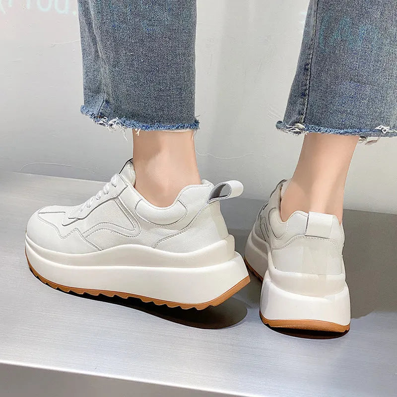 Women's beige cattlehide leather casual sports shoes with cross strap detail and mesh lining