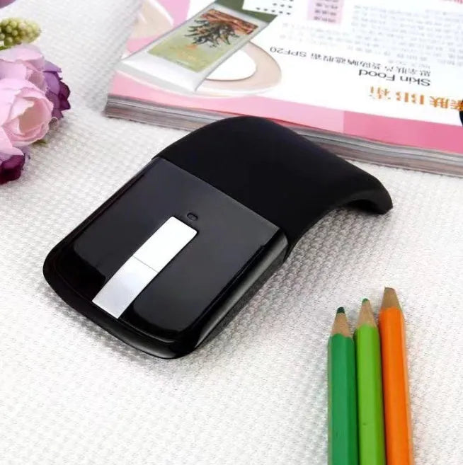 Folding Bluetooth touch wireless mouse showing compact design and multiple colour options
