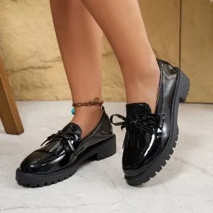 Women's brown loafers with decorative bow on artificial PU leather upper