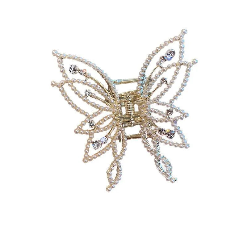 Butterfly-shaped hair clip for women in alloy metal with rhinestone or pearl decorative elements