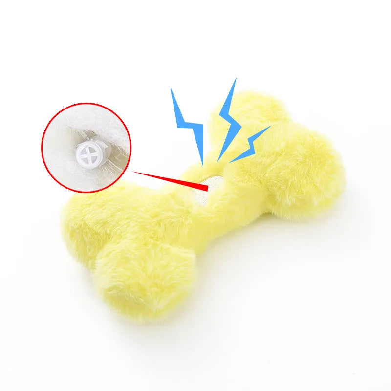 Blue plush love bone dog toy with a vocal element for interactive chewing and play.