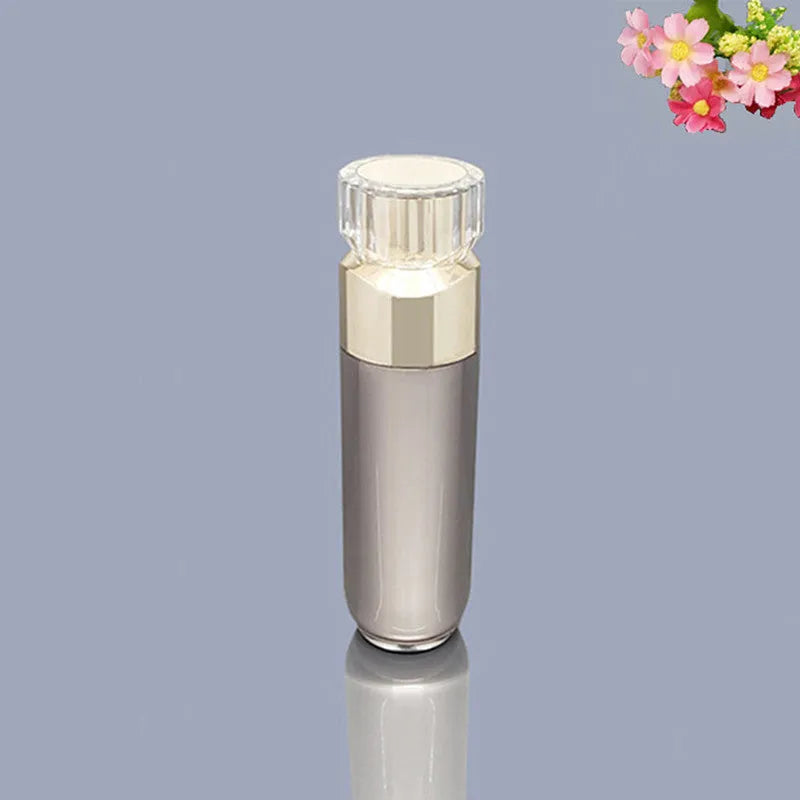 Acrylic cosmetics sub-bottling box with champagne gold and brushed white empty bottles in various sizes