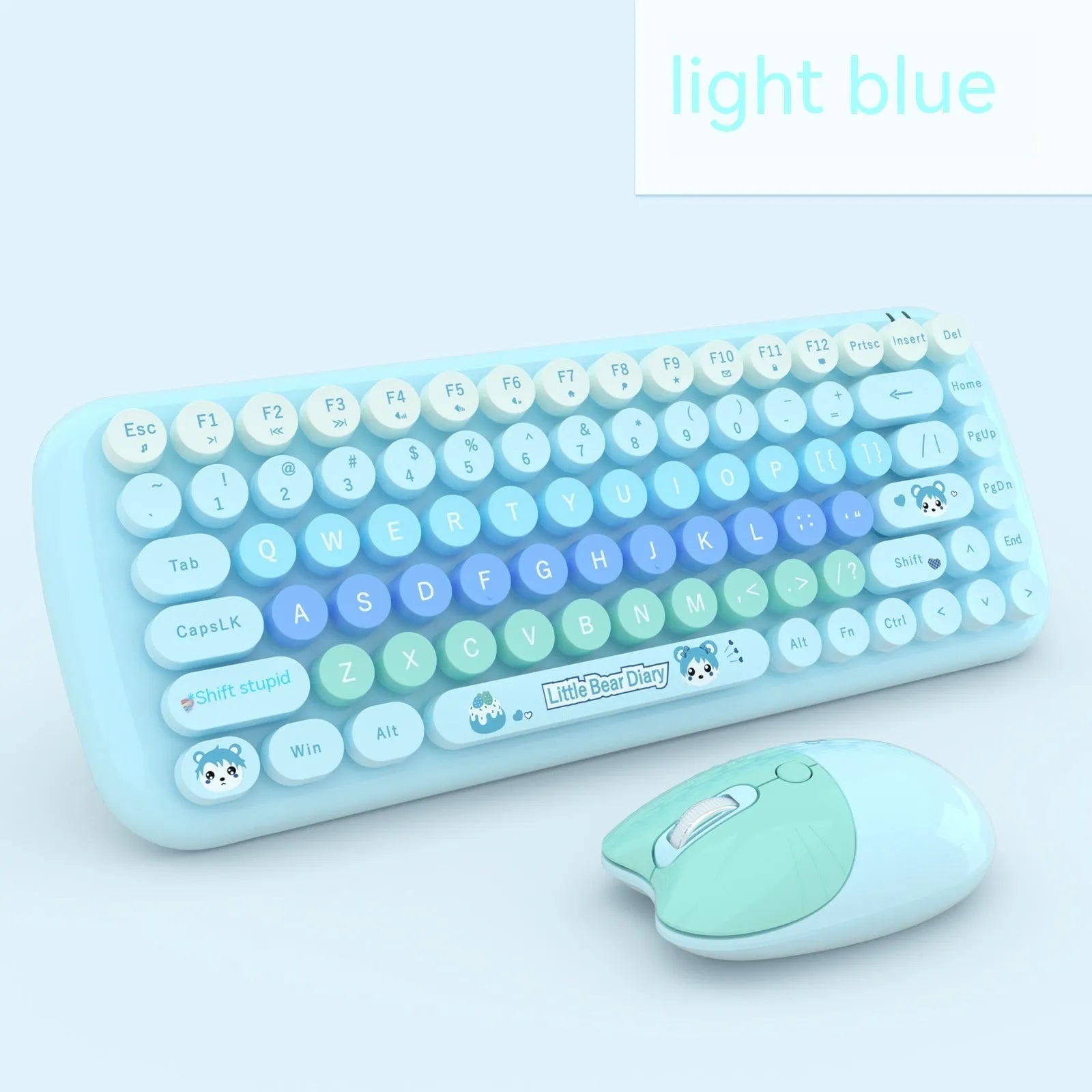 Pink mini cartoon-style wireless keyboard and mouse set on a desk with receiver.