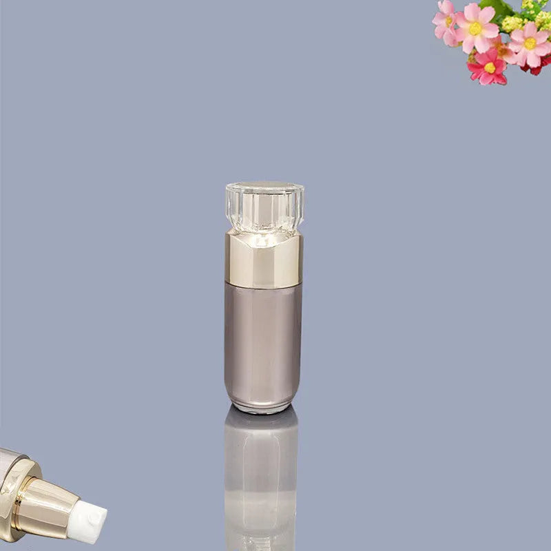 Acrylic cosmetics sub-bottling box with champagne gold and brushed white empty bottles in various sizes