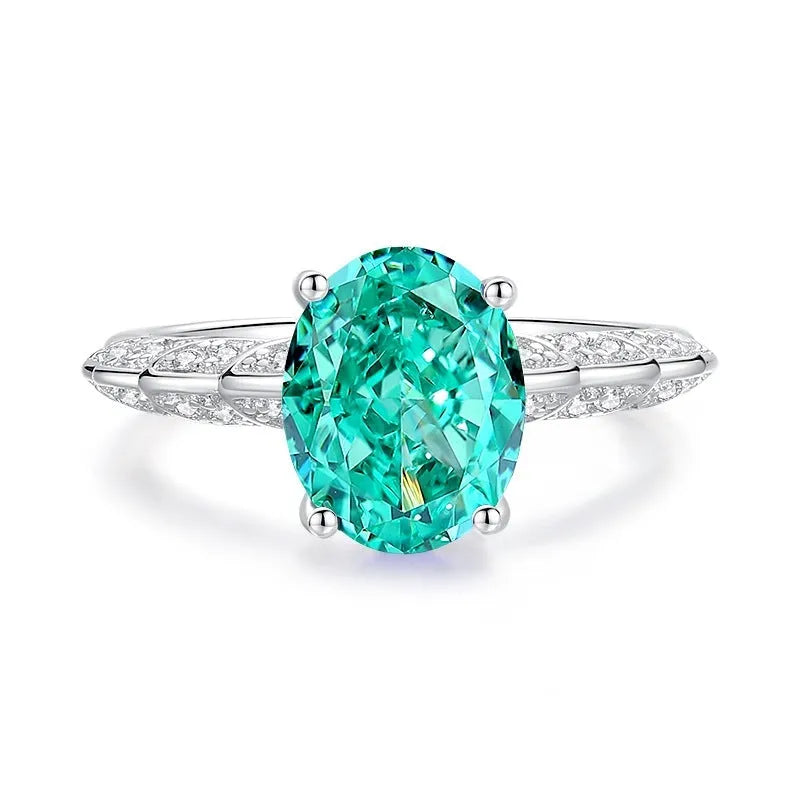 S925 sterling silver ring for women with a green emerald stone set using Palaibahao inlay and diamond accents.