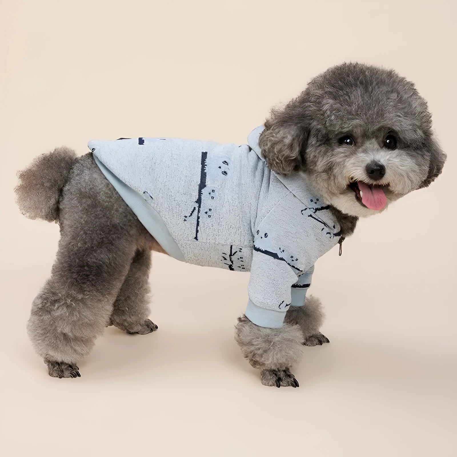 Blue and pink casual dog sweater with front zipper closure showing dog pattern design