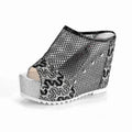 Korean platform sandals with hollowed-out heels, mesh upper, and chunky waterproof soles in black colour