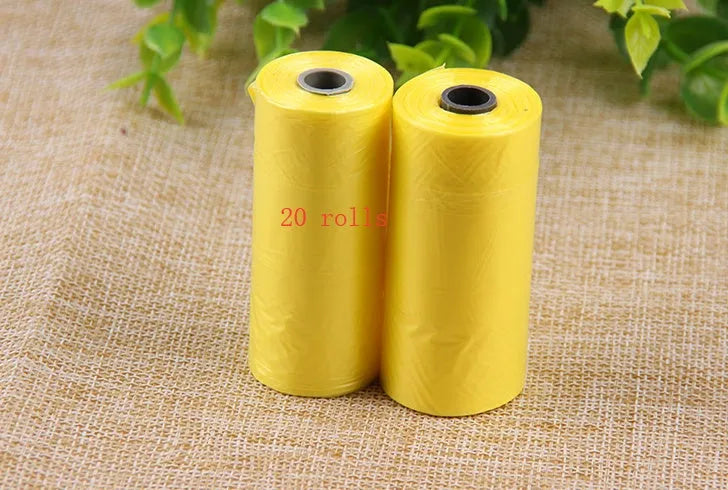Bone-shaped pet garbage bag dispenser in new PP material, 8cm long and 5cm wide, on a table