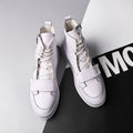 Men's black PU leather ankle boots in high-top sneaker style with microfiber construction