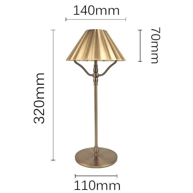 Gold-coloured alloy rechargeable LED desk lamp with a touch switch on its base.