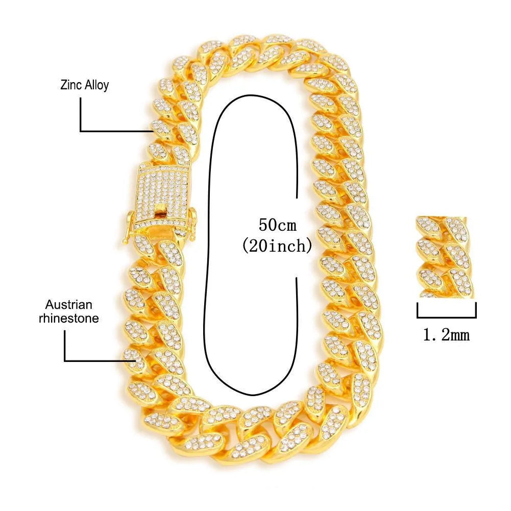 Gold Roman numeral quartz watch with diamond studs and black mesh band, with matching bracelet and necklace.