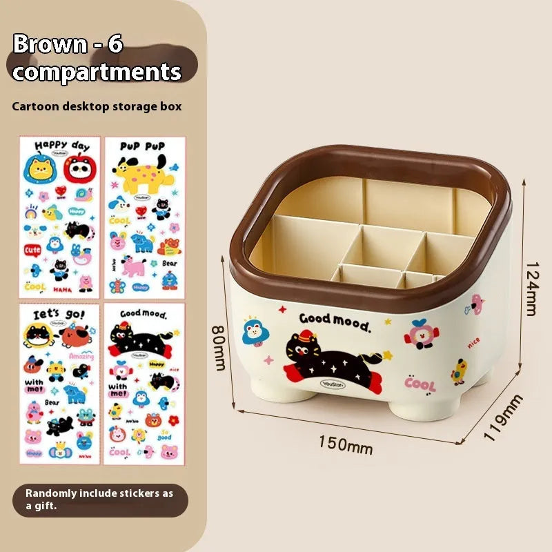 Cartoon-style red and brown plastic desktop storage box with grid compartments for organising pens and stationery.