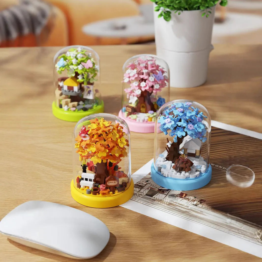 Micro particle building block set showing Cherry Blossom Tree House model in colour box