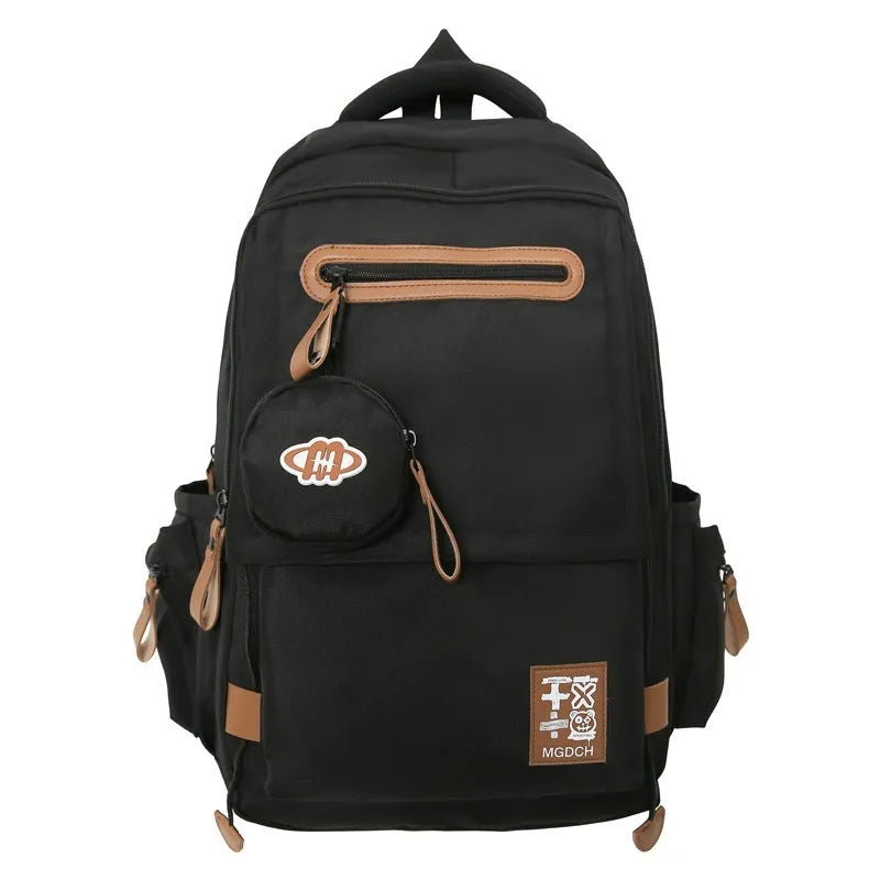 Large capacity nylon backpack for middle school students with curved shoulder straps in multiple colour options