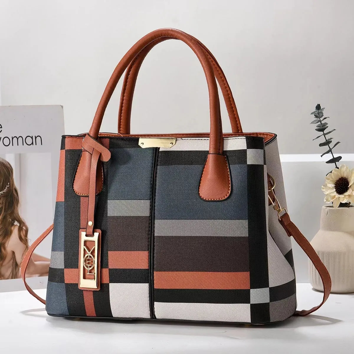Soft PU fashion handbag with leather shoulder strap in horizontal square shape