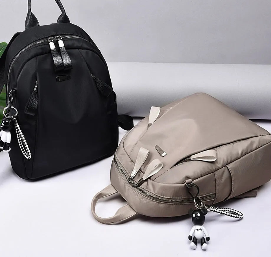 Medium black Oxford cloth fashion rucksack with internal phone and ID pockets