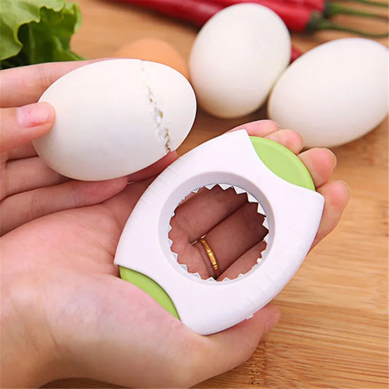Kitchen egg topper gadget in blue with stainless steel cutting edge on suction card packaging