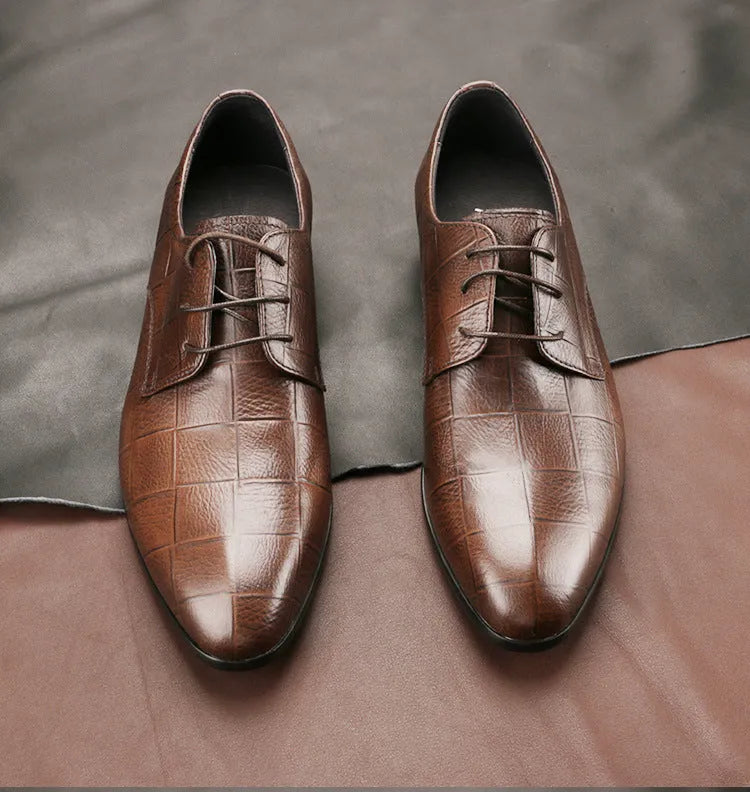 Men's black leather derby shoes with pointed toe and checkered stitching detail