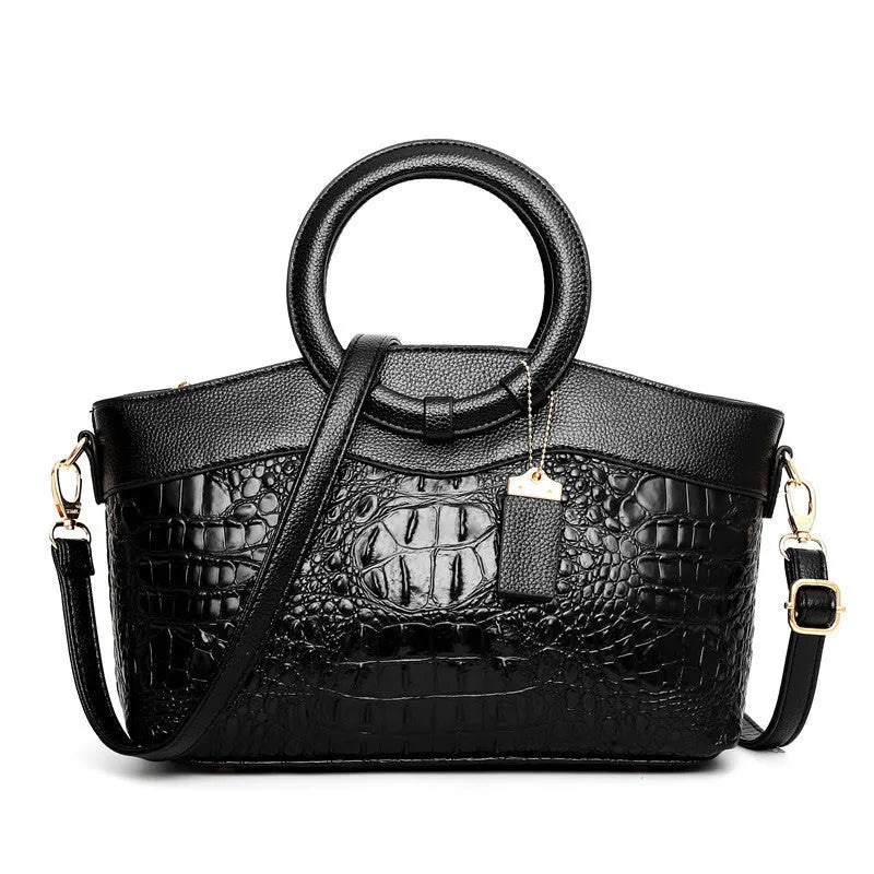 Fabric ladies casual handbag showing multiple compartments including zipper pocket and phone bag