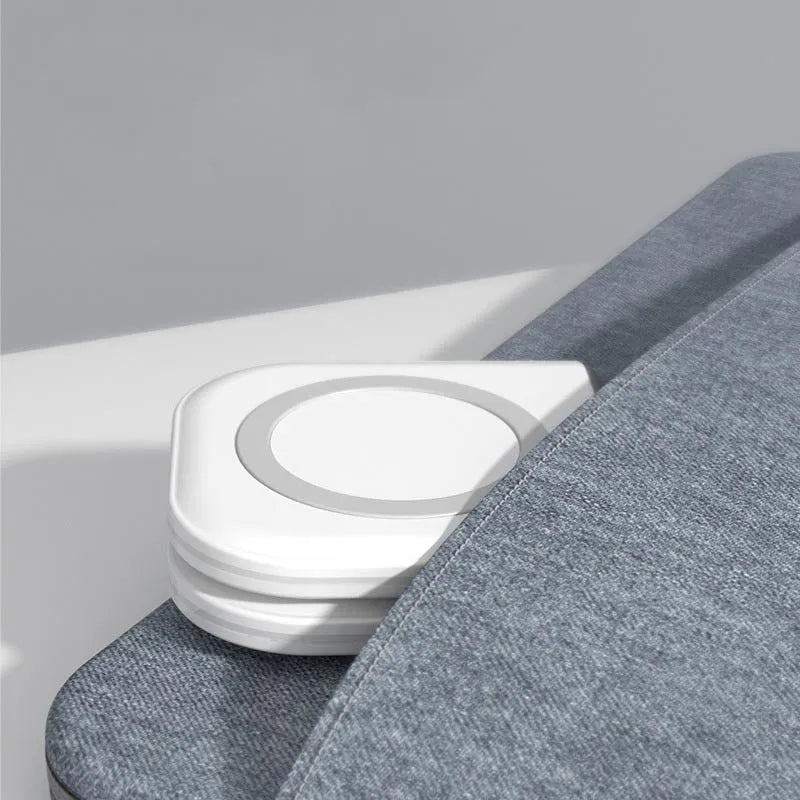 White folding dual magnetic desktop wireless charger with USB Type C ports, 190x11x80 mm, on a desk