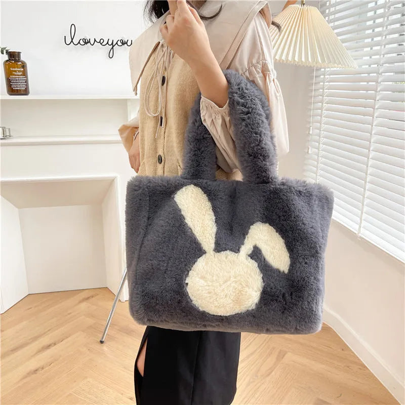 Plush shoulder bag with cartoon rabbit ears design in six colour options