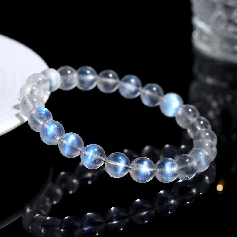 Natural cream body blue moonlight crystal bracelet with minimalist design showing ground finish stone