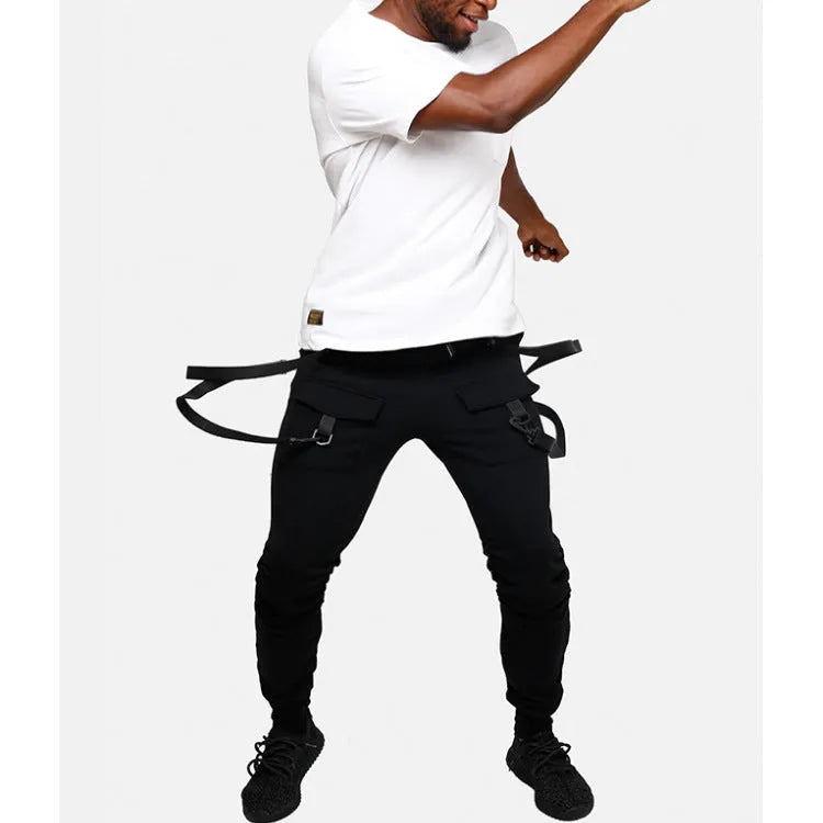 Black cotton blend men's hip hop pencil sweatpants with belt lying flat