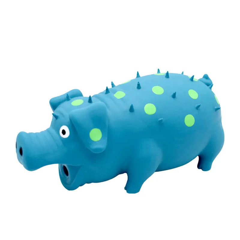 Pig-shaped latex squeaky dog chew toy in various colours with textured surface