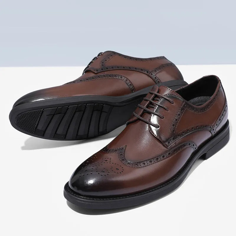 Men's black and brown brogue formal shoes with wingtip perforations, shown on a plain background.