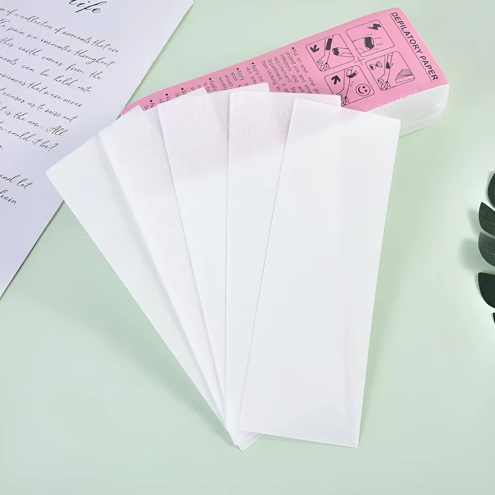 Non-woven fabric hair removal wax paper strips in 50 or 100 piece packaging