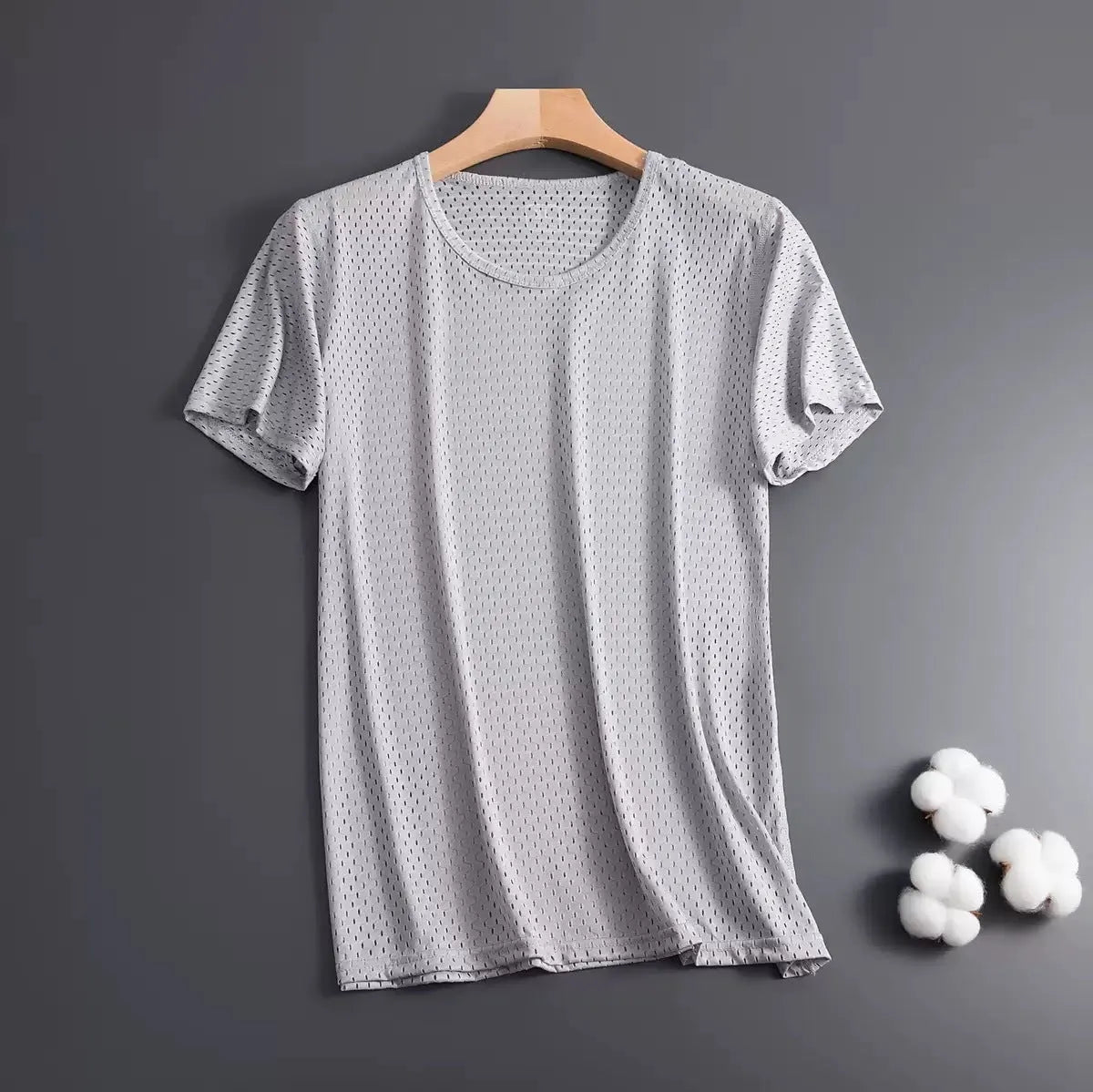 Men's solid colour Ice Silk short sleeve crew neck T-shirt in loose fit on a hanger.