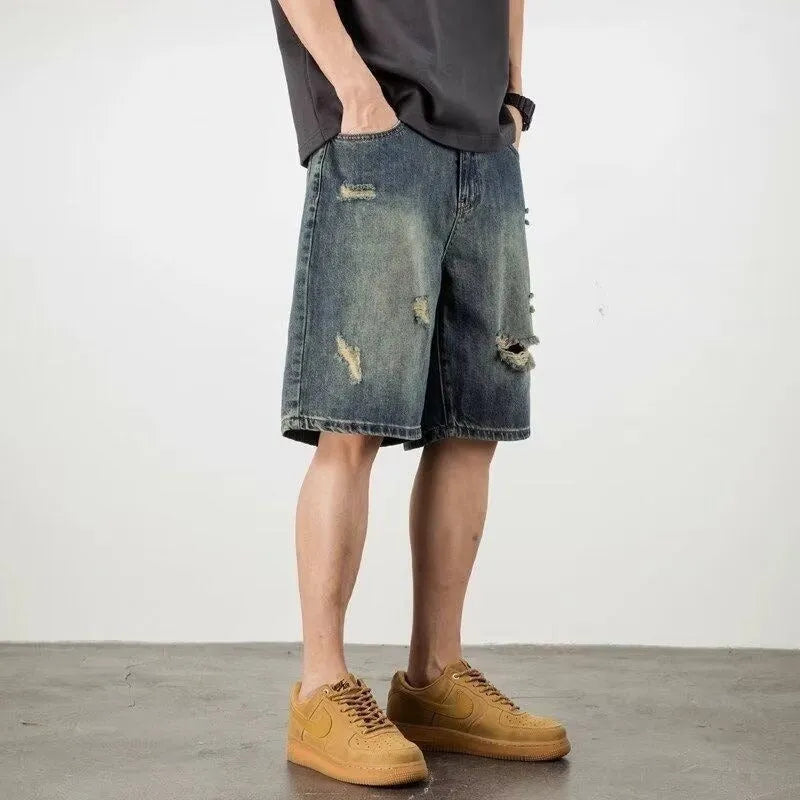 Men's loose fit washed blue denim shorts with straight leg and micro elasticity