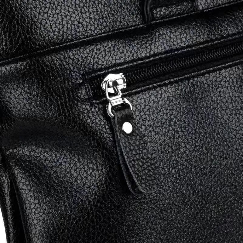 Men's PU leather business messenger bag with splicing detail, measuring 35x30x4cm