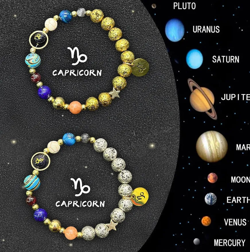 Set of two natural stone beaded bracelets with Zodiac sign charms on a dark background.