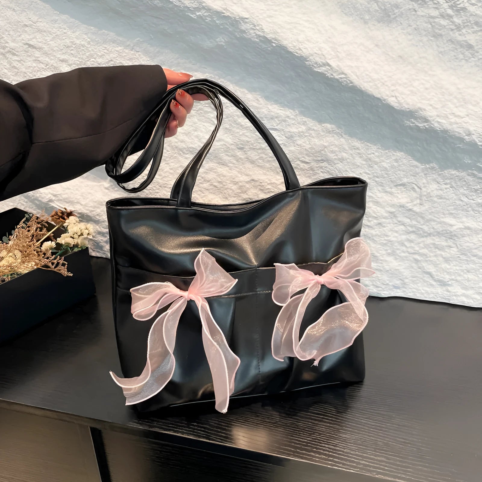 College style bow tote bag in black or pink with large capacity and internal zipper compartment