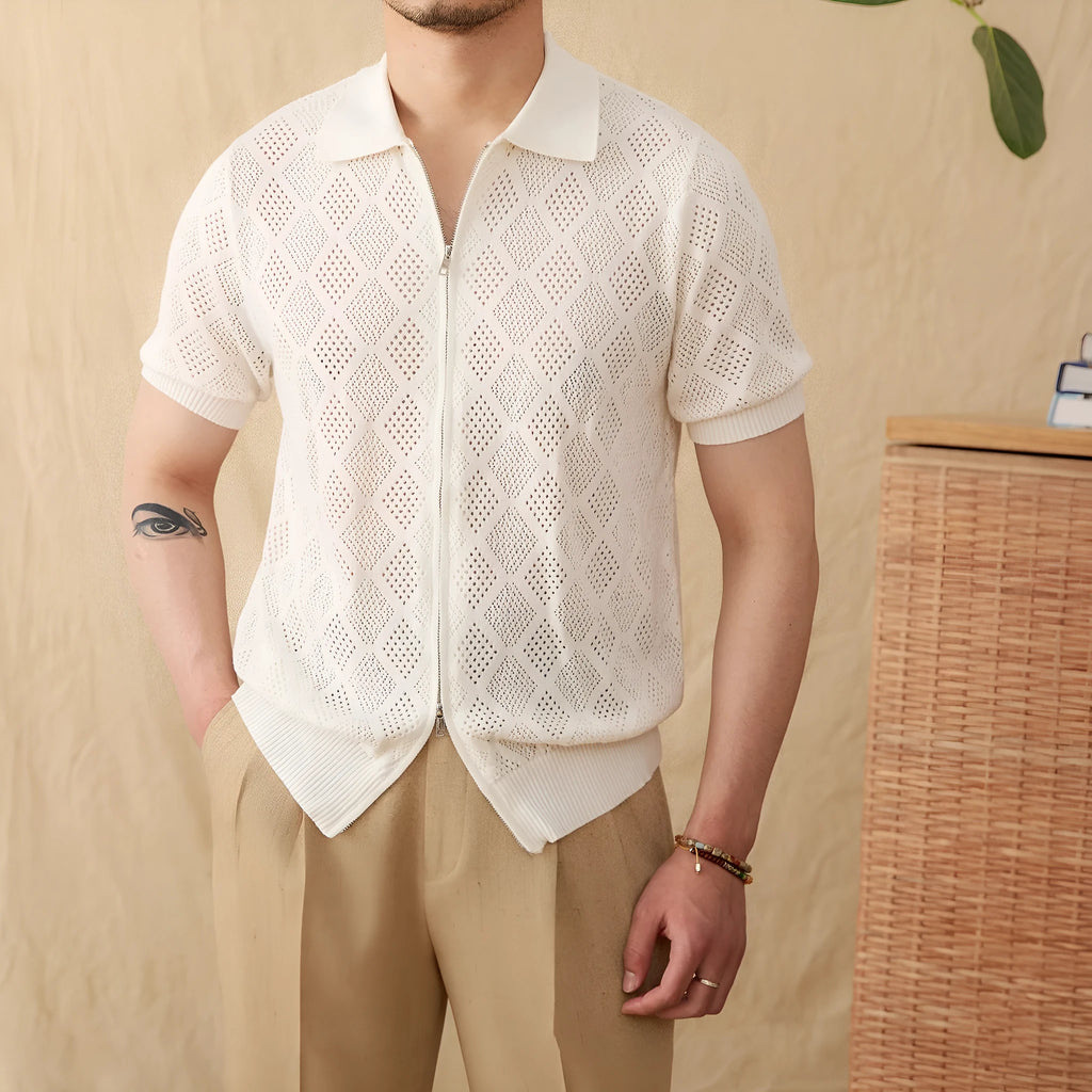 Light brown cotton short sleeve cardigan with zip front and lapel collar on a hanger