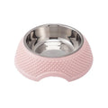 Set of four stainless steel pet bowls with coloured bases, shown from above.