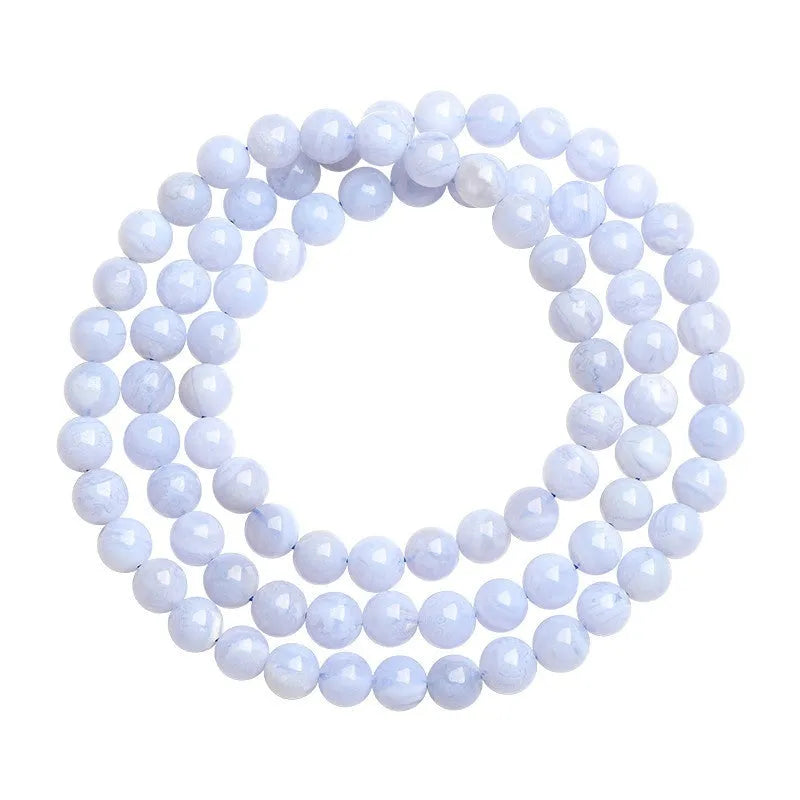 Blue agate bracelet with natural multi-circle pattern and Ruyi elements on wrist