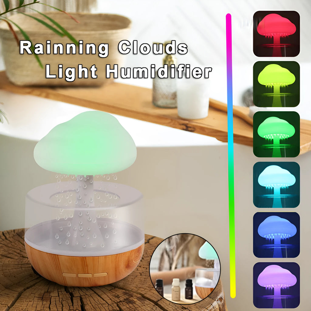 White cloud-shaped humidifier with coloured lights and water droplets