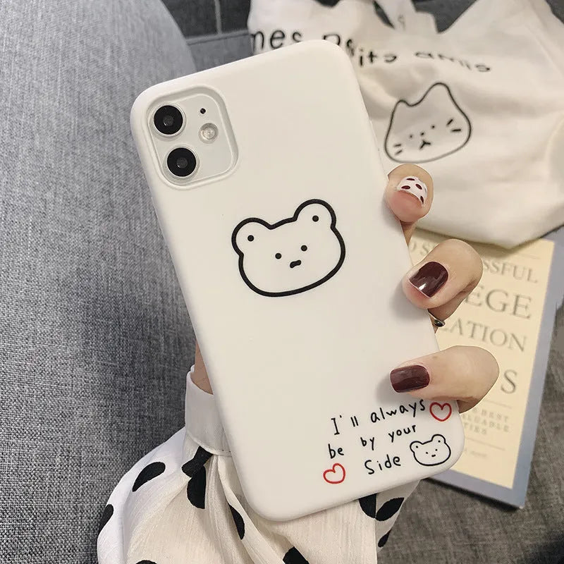 Soft silicone mobile phone case for iPhone with a cartoon Korean bear design on the back.