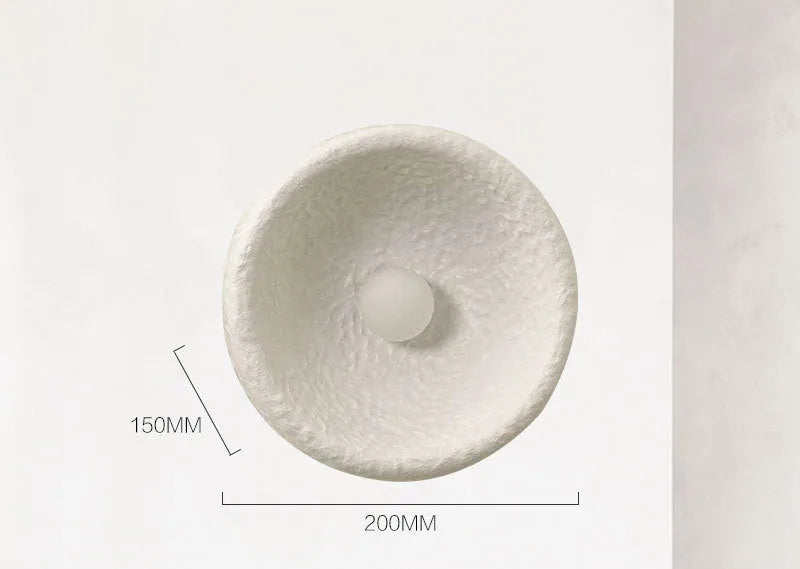 Japanese-style minimalist resin wall lamp in warm light, showing size options.