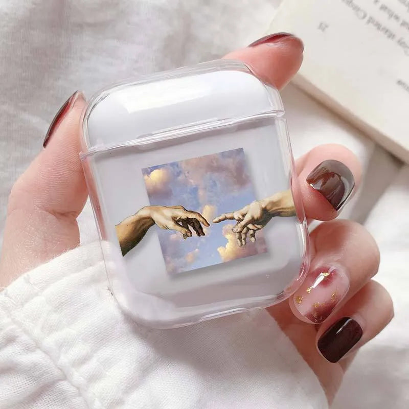 Transparent plastic AirPods protective cover case shown on Apple charging case