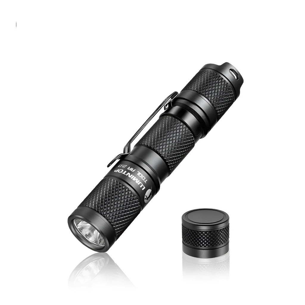 Lumintop Tool AA2.0 black compact keychain flashlight with Cree LED on metallic background