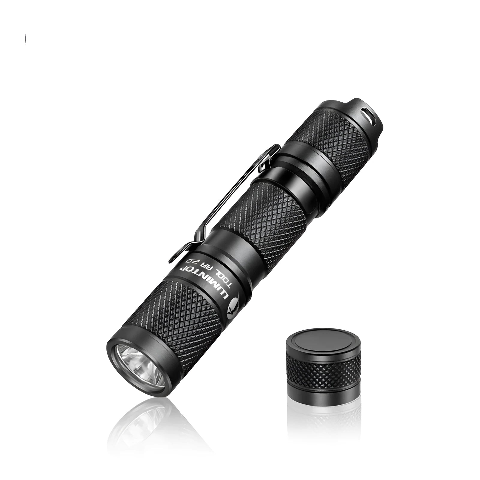 Lumintop Tool AA2.0 black compact keychain flashlight with Cree LED on metallic background