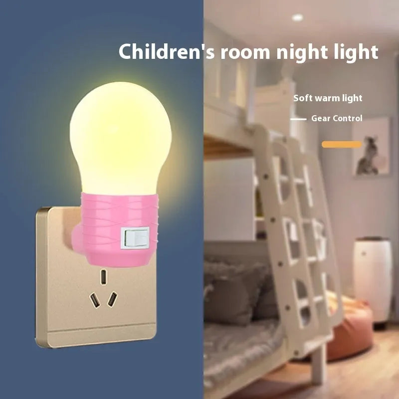 Compact round plug-in bedside lamp in white, blue, or pink for night feeding.