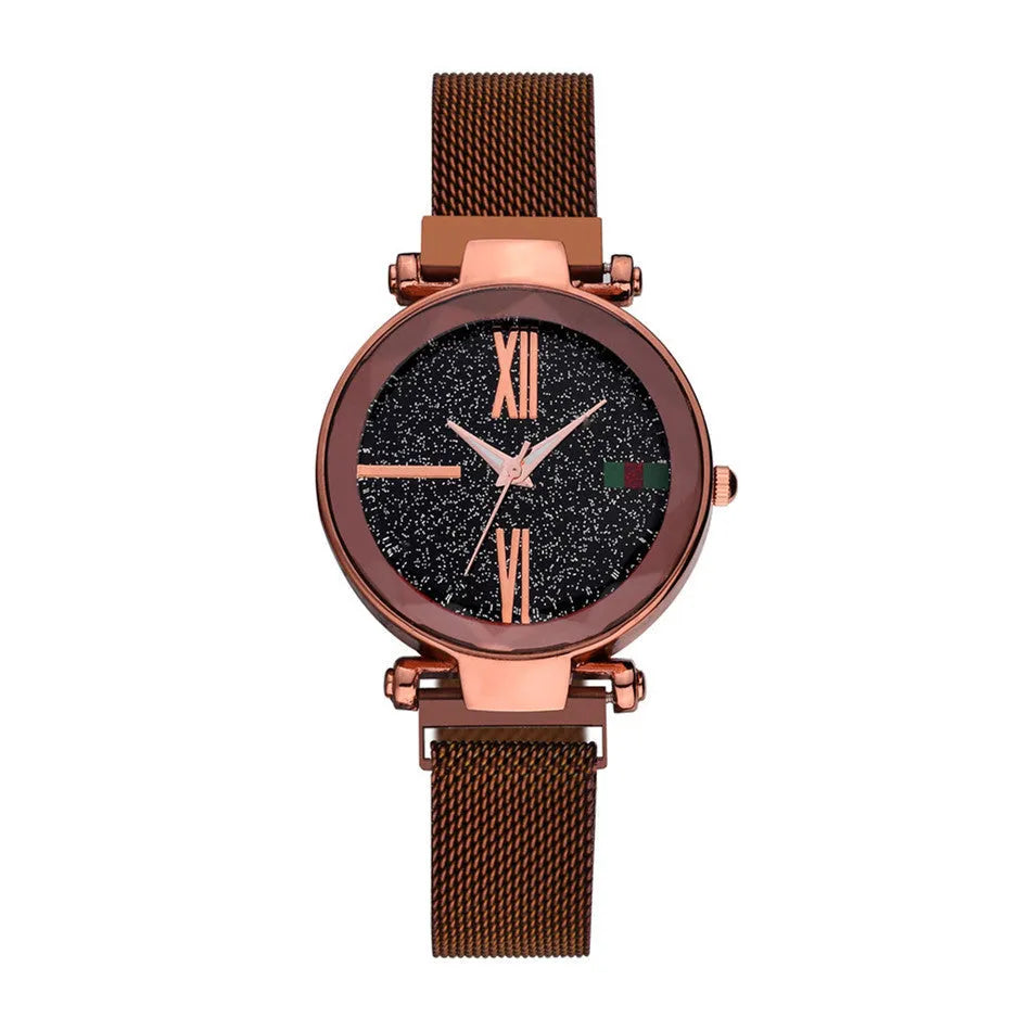 Ladies quartz wristwatch with round 32mm dial and stainless steel strap with magnetic buckle, shown in rose gold colour.